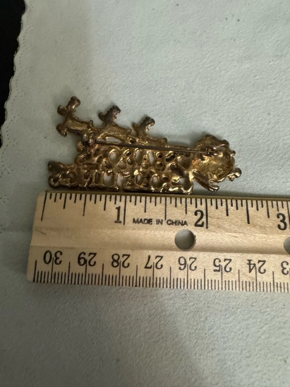 Season's Greetings Gold-tone Santa Sleigh Pin with Red & Green Accents